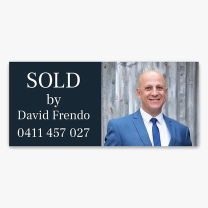 Custom Stickers shown on a real estate signboard