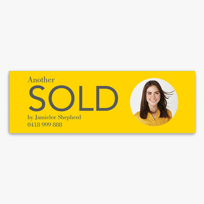 Custom Stickers shown on a real estate signboard