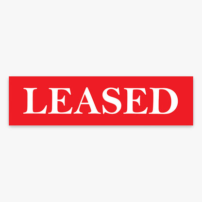 Leased Stickers - First National (Rectangle) Large shown on a real estate signboard