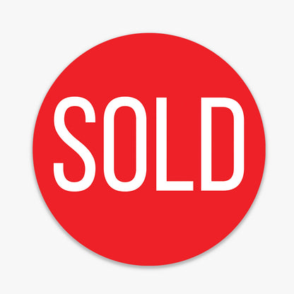 Generic Sticker (Round) (Multi Colour) - Bebas Neue shown on a real estate signboard